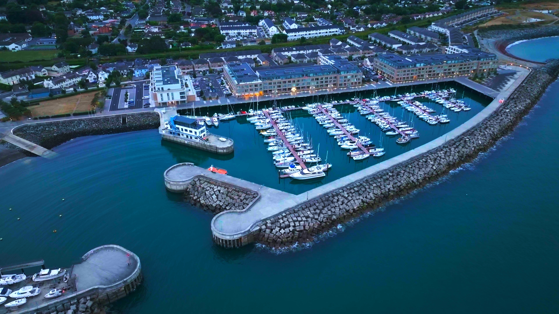 Aerial view of Greystones Harbour Marina at dusk